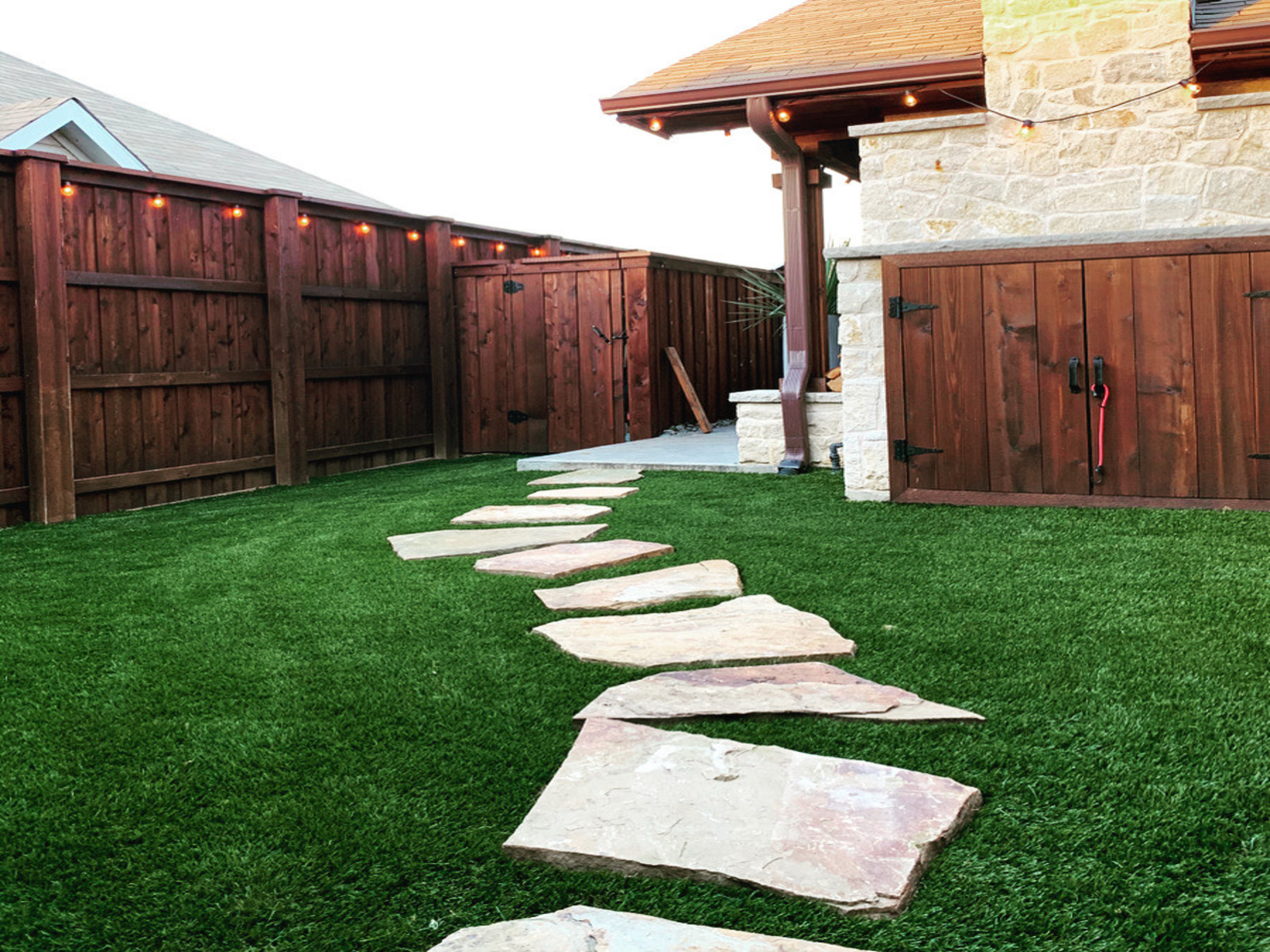 Artificial turf in residential backyard